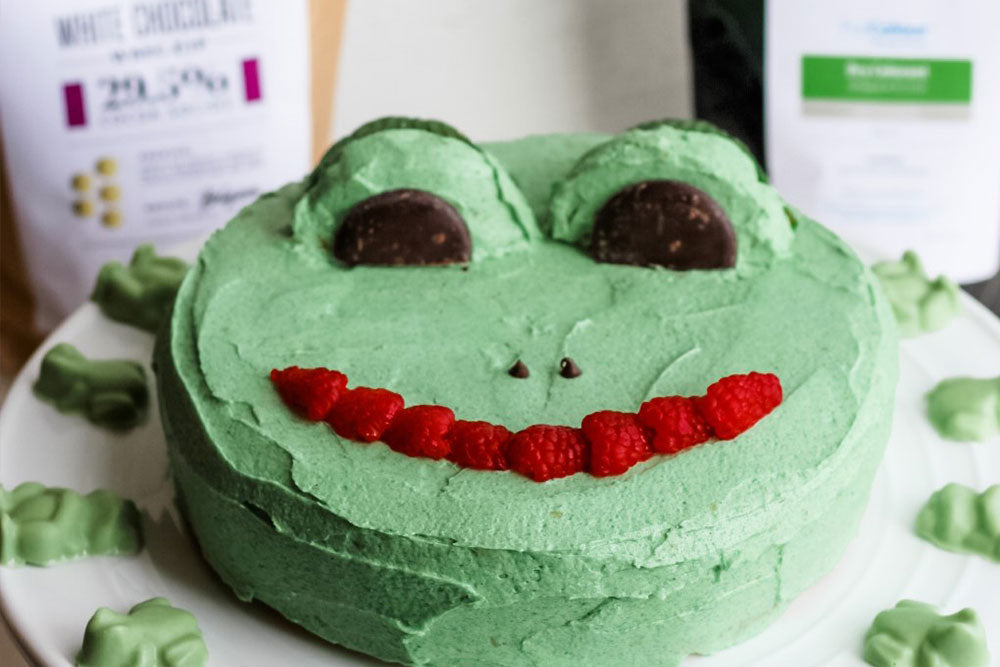 Paleo vanilla frog cake with naturally colored green icing