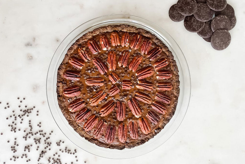 Healthy Chocolate Pecan Pie in a glass baking pan