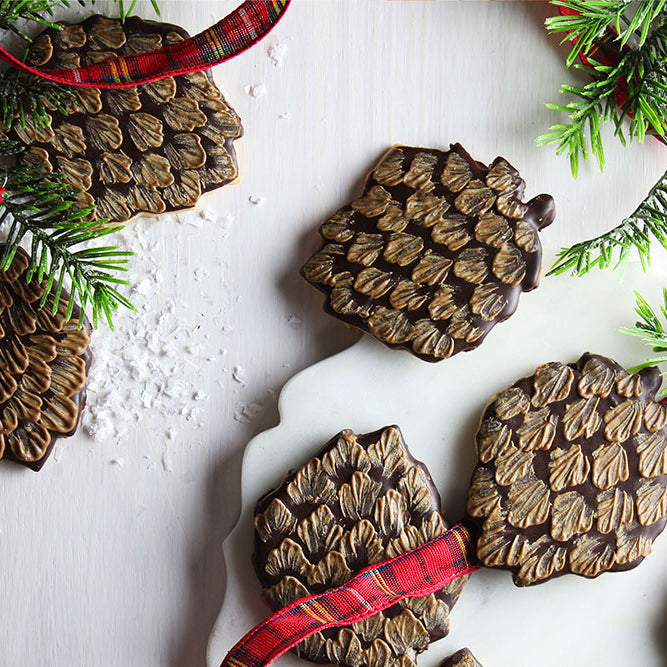 Pine cone shaped sugar cookies coated in chocolate 