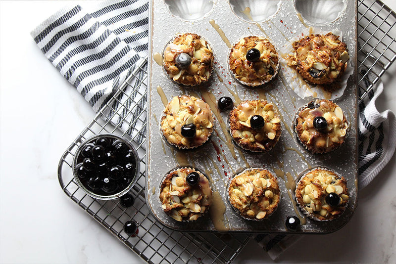Amarena Cherry Almond Muffins in a muffin pan