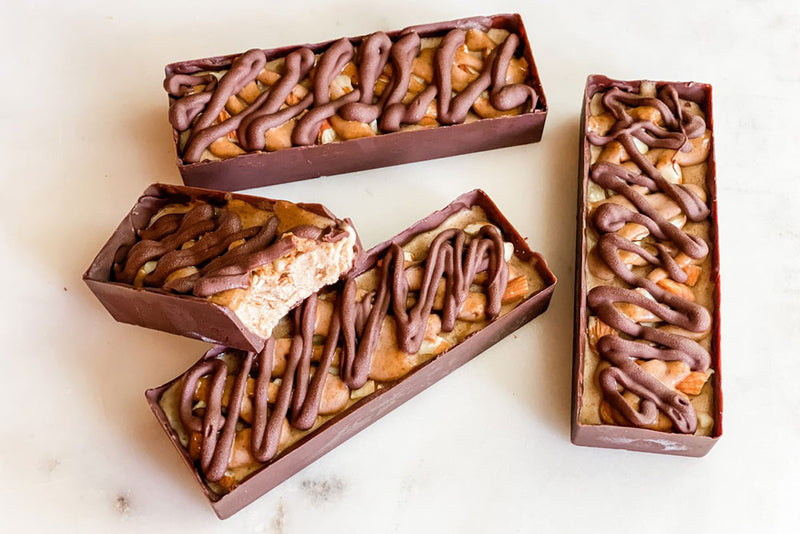 Photo of nice cream bars covered in chocolate