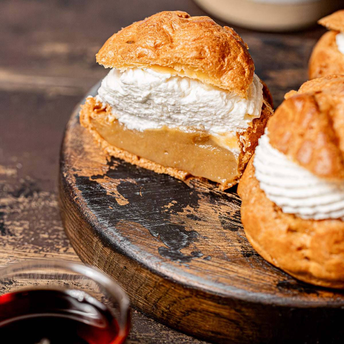 Lemon Meringue Tarts on Marble.