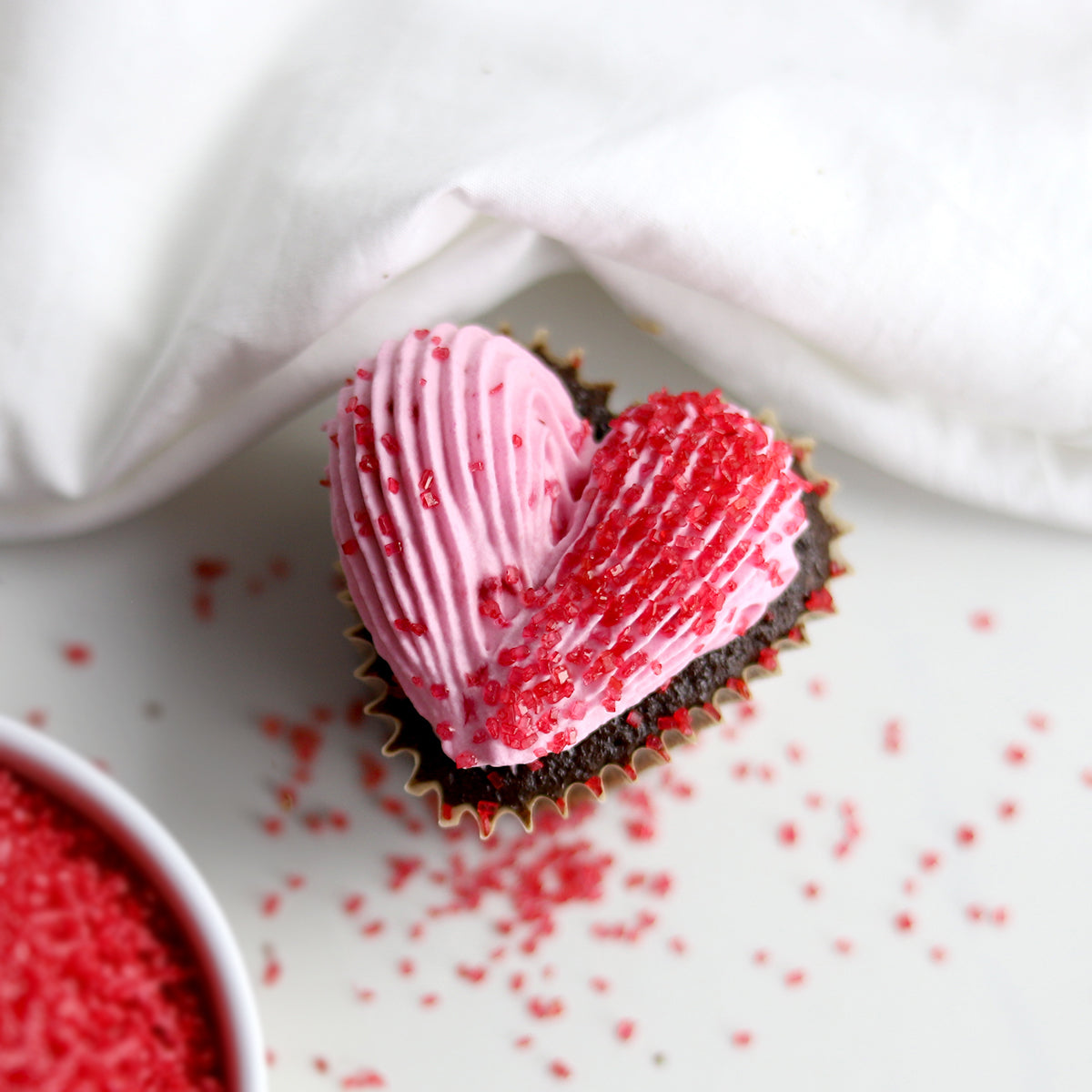 Heart Shaped Cupcake with Red Crystal Sugar Sprinkles