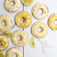 Cake Donuts with Lemon flavored donut glaze with yellow sugar confetti decoration