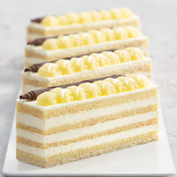 Vanilla Sponge and Lemon Flavored Cream Layered Cake Slices