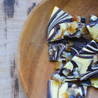 Dark and White Chocolate Marbled Bark with Candied Orange Cubes