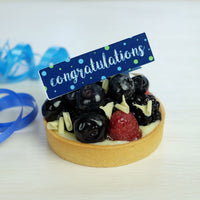 Congratulations Chocolate Decor on fruit tart