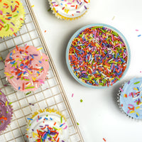 All natural rainbow sprinkles on cupcakes