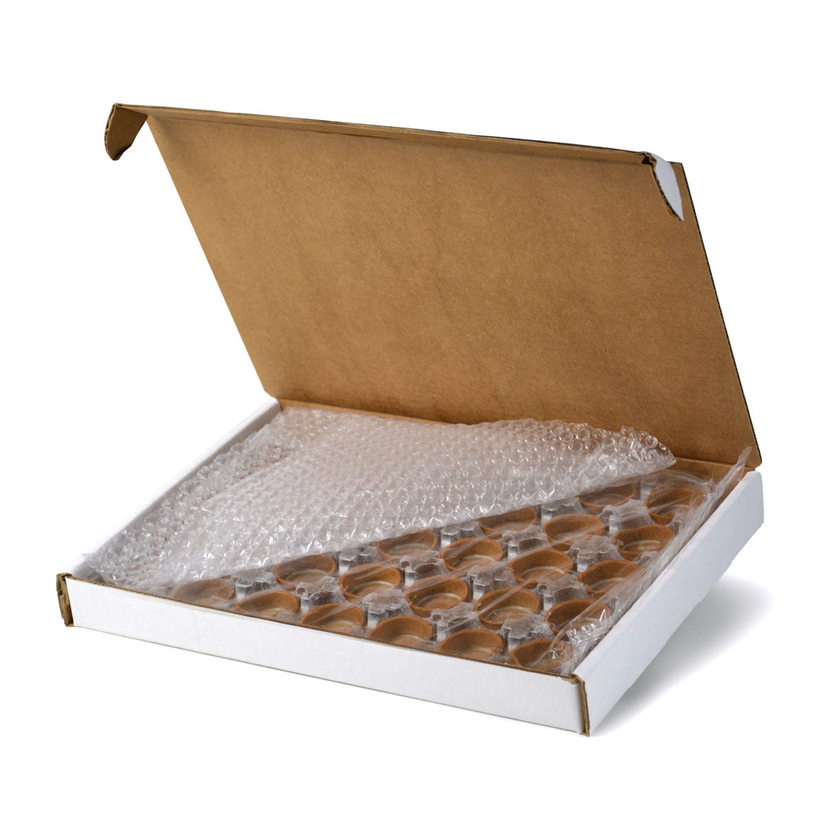 Mini round chocolate tart inside box packaging