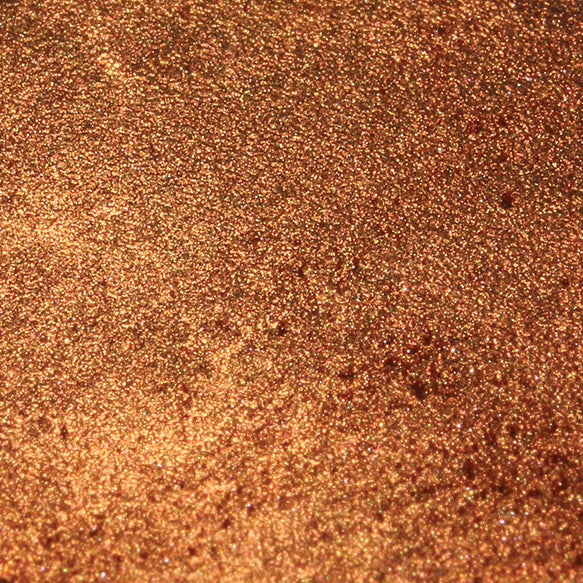 Brilliant Powder-Copper shown on dark chocolate